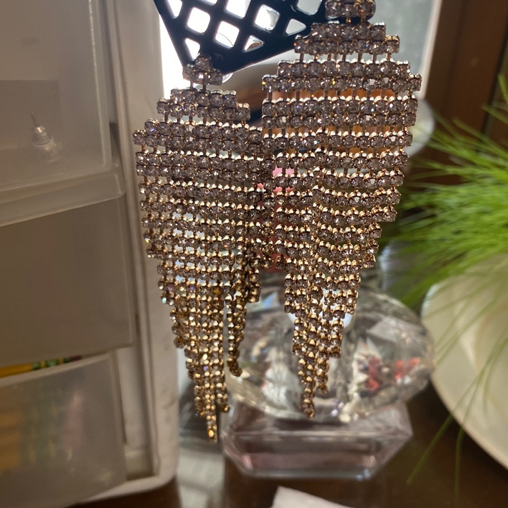Three pair of costume earrings